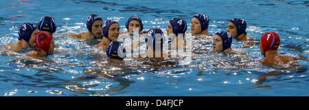 Captain Soeren Mackeben (5th L) of Germany talks to his teammates during the men·s water polo preliminary round group B match 3 between Serbia and Germany competition in the Yingdong Natatorium at the Beijing 2008 Olympic Games, Beijing, China, 10 August 2008. Photo: Marcus Brandt dpa (c) dpa - Bildfunk Stock Photo