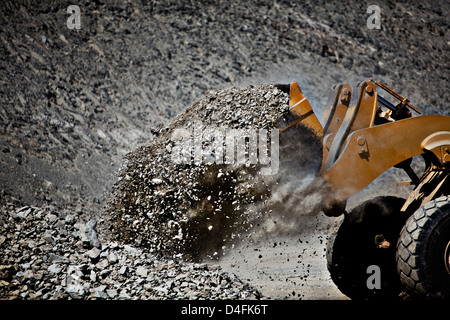 Digger working in quarry Stock Photo