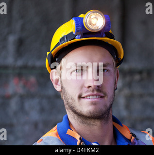 Close up of worker's smiling face Stock Photo