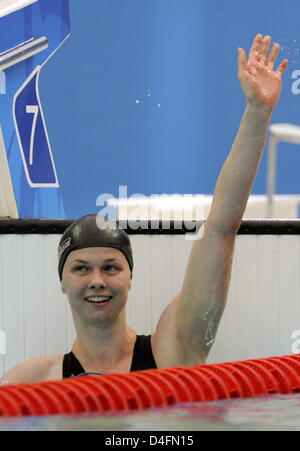 Firstplaced Britta Steffen from Germany celebrates after the swimming women's 100m freestyle final at the Beijing 2008 Olympic Games in Beijing China, 15 August 2008. Steffen won in 53.12 seconds and set up a new olympic record. Photo: Bernd Thissen dpa (c) dpa - Bildfunk Stock Photo