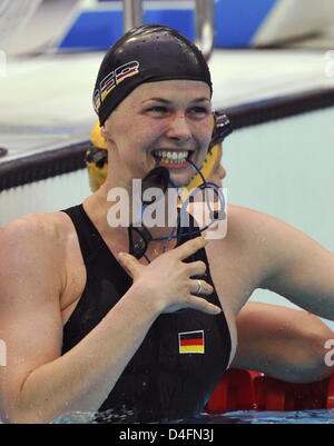 Firstplaced Britta Steffen from Germany (L) celebrates after the women's 100m freestyle final at the Beijing 2008 Olympic Games in Beijing China, 15 August 2008. Steffen won in a time of 53.12 seconds and set up a new olympic record. Photo: Peer Grimm Stock Photo