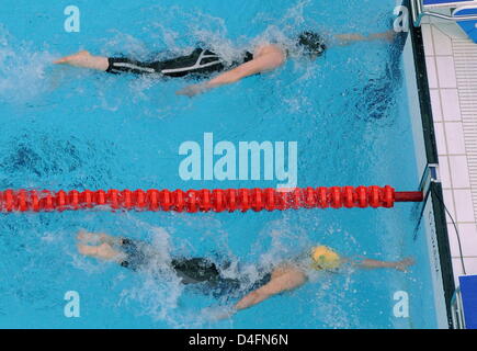 Britta Steffen from Germany (top) competes against Lisbeth Trickett from Australia during the women's swimming 100m freestyle final at the Beijing 2008 Olympic Games in Beijing China, 15 August 2008. Steffen won in 53.12 seconds and set up a new olympic record. Photo: Bernd Thissen dpa ###dpa### Stock Photo