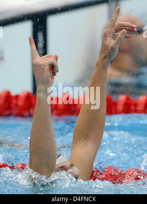 Cesar Cielo Filho from Brazil celebrates after winning the men's 50m freestyle final during the Beijing 2008 Olympic Games in Beijing, China ,16 August 2008. Photo: Bernd Thissen dpa (c) dpa - Bildfunk Stock Photo