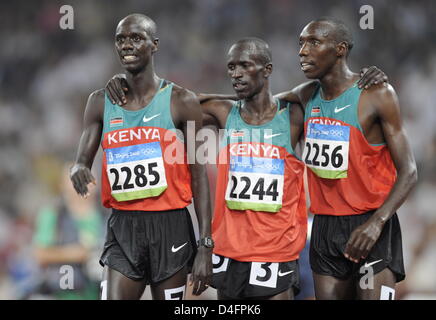 Brimin Kiprop Kirpruto (L-R), Ezekiel Kemboi and Richard Kipkemboi Mateelong, all from Kenya, seen after the Men's 3000m Steeplechase Final during the Beijing 2008 Olympic Games in Beijing, China, 18 August 2008. Kirpruto won the race, Mateelong was third placed and Kemboi became seventh. EPA/BERND THISSEN ###dpa### Stock Photo