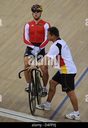 Maximilian Levy (L) of Germany and coach Detlef Uibel prior the start in the Men's Sprint Semifinal in the Cycling - Track competition at Laoshan Velodrome at the Beijing 2008 Olympic Games, Beijing, China, 19 August 2008. Photo: Peer Grimm dpa ###dpa### Stock Photo