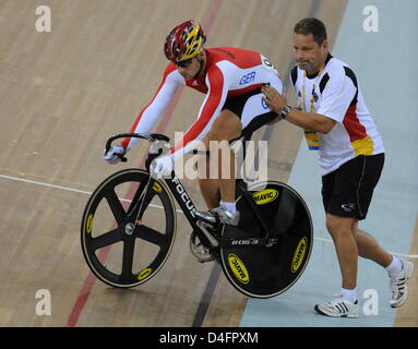 Maximilian Levy (L) of Germany and coach Detlef Uibel prior the start in the Men's Sprint Semifinal in the Cycling - Track competition at Laoshan Velodrome at the Beijing 2008 Olympic Games, Beijing, China, 19 August 2008. Photo: Peer Grimm dpa ###dpa### Stock Photo