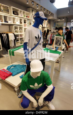 An interior view of the new 'Adidas Brand Center', so far the world's largest adidas store, in Beijing, China, 19 August 2008. The store covers 3,170sqm and four storeys of 'Sanlitun Village Shopping Center'. Photo: Federico Gambarini Stock Photo