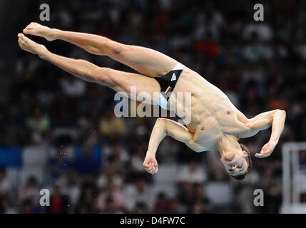 German diver Sascha Klein competes during men's 10m platform semifinal ...