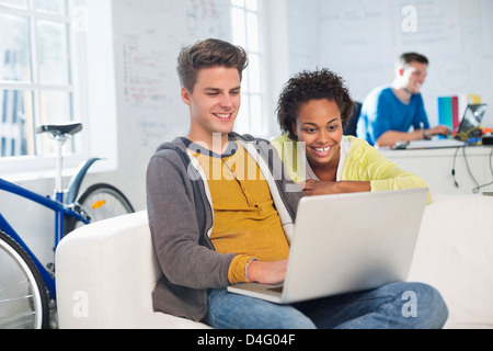 Business people using laptop in office Stock Photo