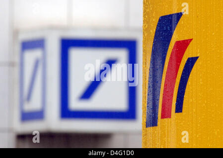 The photo shows the logos of a branch of Deutsche Bank (L) and of the Postbank headquarters in Bonn, Germany, 12 September 2008. On this day, the supervisory board of Deutsche Post met in Bonn. This was told to German Press Agency dpa by an informed party. It is expected that the board decides about the entrance of Deutsche Bank at Postbank. Photo: Federico Gambarini Stock Photo