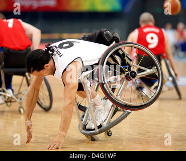 Florian Fischer of Germany tumbles in the quarter-finals at the Beijing 2008 Paralympic Games in Beijing, China, 13 September 2008. Photo: ROLF VENNENBERND Stock Photo