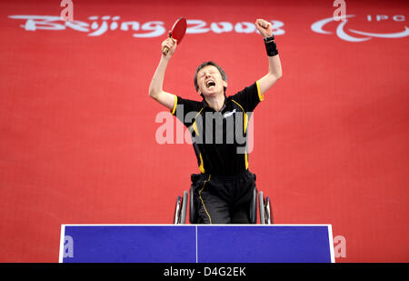 German table tennis player Andrea Zimmerer wins against Chinese Gu during the finals of the 13th Paralympic Games in Beijing, China, 16 September 2008. China won the gold medal, Germany got silver. Photo: Rolf Vennenbernd Stock Photo