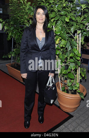 Israeli actress Hiam Abbass arrives at the premiere of the film 'Lemon Tree' at Cinenova Arthouse-Centre in Cologne, Germany, 22 September 2008. The film tells the story of Palestinian widow Salma (played by Abbass), whose lemon grove suddenly becomes a security risk. To save her grove from deforestation, Salma even goes to Israel's High Court, together with her lawyer Ziad Daud. T Stock Photo