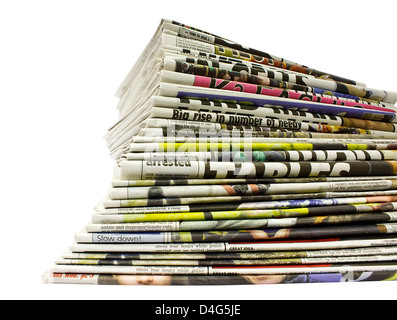 collection of different color newspapers stacked in pile isolated on white Stock Photo