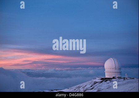 The Canada-France-Hawaii Observatory evening  Mauna Kea on Hawaii building mountain top dome Telescope. Sunset. Stock Photo