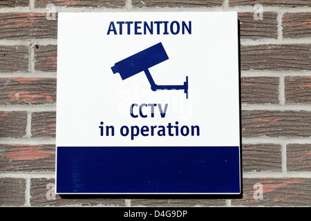 A sign warning passengers CCTV is in Operation on a platform at a rural Scotrail Train Station, Lochwinnoch, Renfrewshire, Scotland, UK, Europe Stock Photo