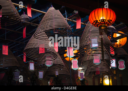 Hanging coiled incense in the Man Mo Temple in Sheung Wan, Hong Kong. Stock Photo