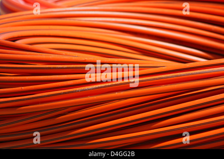 orange long cable on stock Stock Photo