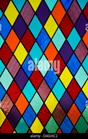 Stained glass with multi colored diamond pattern Stock Photo