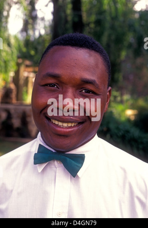 1, one, Zimbabwean, man, adult man, waiter, worker, working, Rhodes-Nyanga Hotel, Nyanga, Manicaland Province, Zimbabwe, Africa Stock Photo