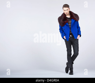 Stylish young man in a fashion pose Stock Photo