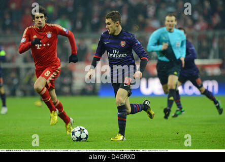 Munich, Germany. 13th March 2013. (R-L) Aaron Ramsey (Arsenal), Javi Martinez (Bayern), MARCH 13, 2013 - Football / Soccer : UEFA Champions League Round of 16, 2nd leg match between FC Bayern Munchen 0-2 Arsenal at Allianz Arena in Munich, Germany. (Photo by Takamoto Tokuhara/AFLO/Alamy Live News) Stock Photo