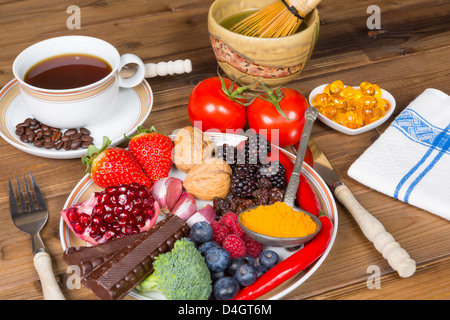 Drinks and food with antioxidant character on a lunch table Stock Photo