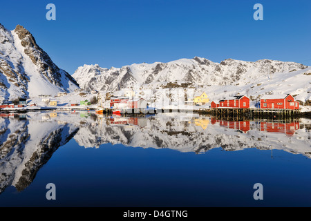 Remote fishing village reflected in water, Lofoten, Nordland, Norway, Europe Stock Photo
