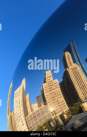 Skyscrapers reflecting in the Cloud Gate steel sculpture by Anish Kapoor, Millennium Park, Chicago, Illinois, USA Stock Photo