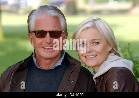 US-actor George Hamilton poses with his partner, doctor Barbara Sturm, in Duesseldorf, Germany, 16 June 2008. Photo: Horst Ossinger Stock Photo