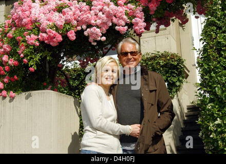 US-actor George Hamilton poses with his partner, doctor Barbara Sturm, in Duesseldorf, Germany, 16 June 2008. Photo: Horst Ossinger Stock Photo