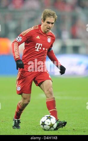 Munich, Germany. 13th March 2013. Munich's Philipp Lahm in action during the UEFA Champions League soccer round of sixteen between FC Bayern Munich and Arsenal FC at Fußball Arena München in Munich, Germany, 13 2012. Photo: Marc Müller dpa /Alamy Live News Stock Photo