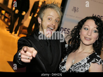 Former Brosis-singer Ross Anthony and Ina pose during the presentation of Ex-Spice Girl Victoria Beckham's jeans collection 'dVb' at a fashion store in Duesseldorf, Germany, 15 October 2008. Beckham introduced special guests and celebrities to the highlights of her collection. Photo: David Ebener Stock Photo