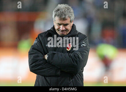 Energie Cottbus head coach Bojan Prasnikar (Slovenia) is disappointed after the Bundesliga match against Energie Cottbus at SchuecoArena in Bielefeld, Germany, 28 October 2008. The match ended in a 1-1 tie. Photo: Friso Gentsch (ATTENTION: BLOCKING PERIOD! The DFL permits the further utilisation of the pictures in IPTV, mobile services and other new technologies only two hours afte Stock Photo