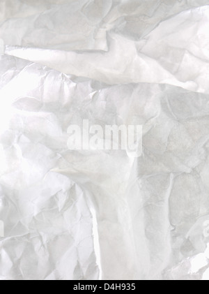 A crumpled whit paper texture for background use Stock Photo