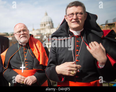 German cardinals Cardinal Rainer Maria Woelki (R) and Cardinal Reinhard Marx speak to the press after the new pope has been elected in the Vatican, 14 March 2013. Photo: MICHAEL KAPPELER Stock Photo