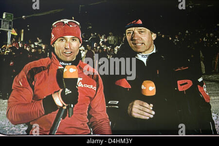 Peter Schlickenrieder (L) and Markus Klotz (R) seen on a monitor during the ?outside bet? of the German TV show ?Wetten, dass...?? (literally: I bet, that...) at Baden-Arena in Offenburg, Germany, 24 January 2009. The last time the TV show took place in Offenburg was in 1995. After the conferment of Germany?s Bambi awards in November 2008, the TV show is the second media mega event Stock Photo