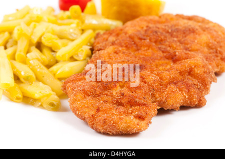 Selective focus on the wiener schnitzel Stock Photo