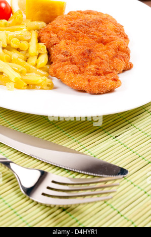 Selective focus on the schnitzel Stock Photo