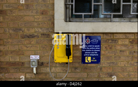 Police Telephone Epsom Police Station Surrey Many police stations now unmanned Stock Photo