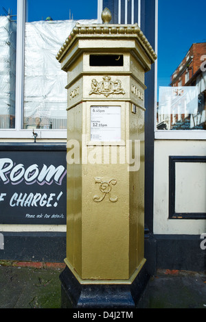 Gold painted postbox in honour of Sophie Wells Exchequer Gate Lincoln Lincolnshire England Stock Photo