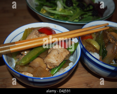 Chinese food and chop sticks Stock Photo