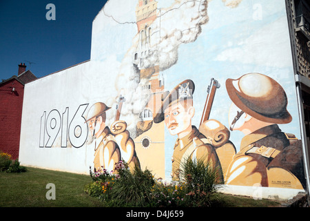 A mural on the side of a house commemorating the WWI Battle of the Somme in 1916, Albert, France. Stock Photo