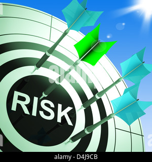 Risk On Dartboard Showing Dangerous Or Insecure Stock Photo