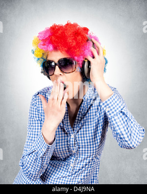 Female with abstract wig and headphones Stock Photo