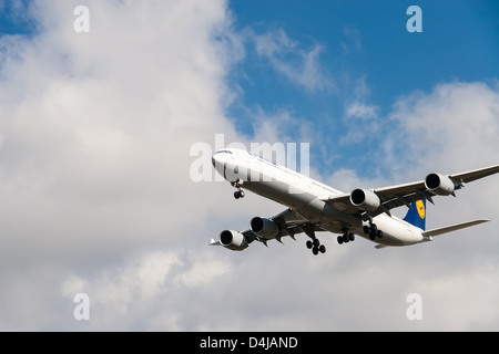 Lufthansa airliner Airbus A340 - 600 approaching Vancouver International Airport Stock Photo