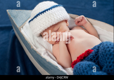 Newborn baby boy wearing a fisherman costume Stock Photo - Alamy