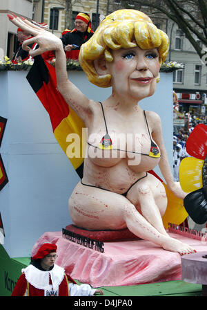 A float with an optically ?upgraded? version of German Chancellor Merkel seen during the Shrove Monday parade in Cologne, Germany, 23 February 2009. On Shrove Monday tens of thousands carnival goers celebrate in the streets of Duesseldorf, Cologne and other carnival strongholds. Photo: Oliver Berg Stock Photo