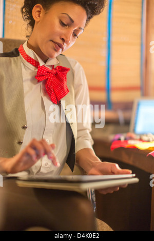 Businesswoman using tablet computer Stock Photo