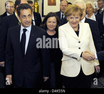 German Chancellor Angela Merkel meets French President Nicolas Sarkozy prior to the G-20 summit in London, United Kingdom, 01 April 2009. Photo: TIM BRAKEMEIER Stock Photo